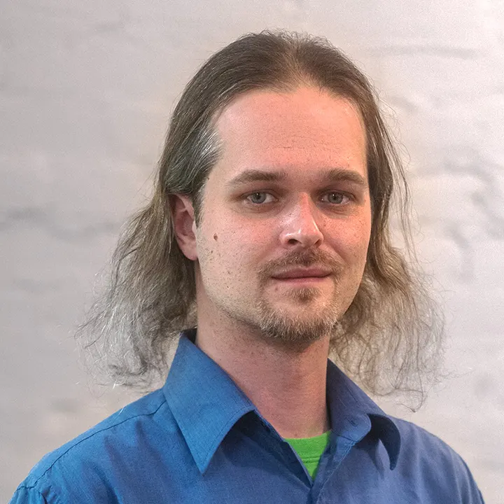 headshot of Ian Ediger, Lead Developer