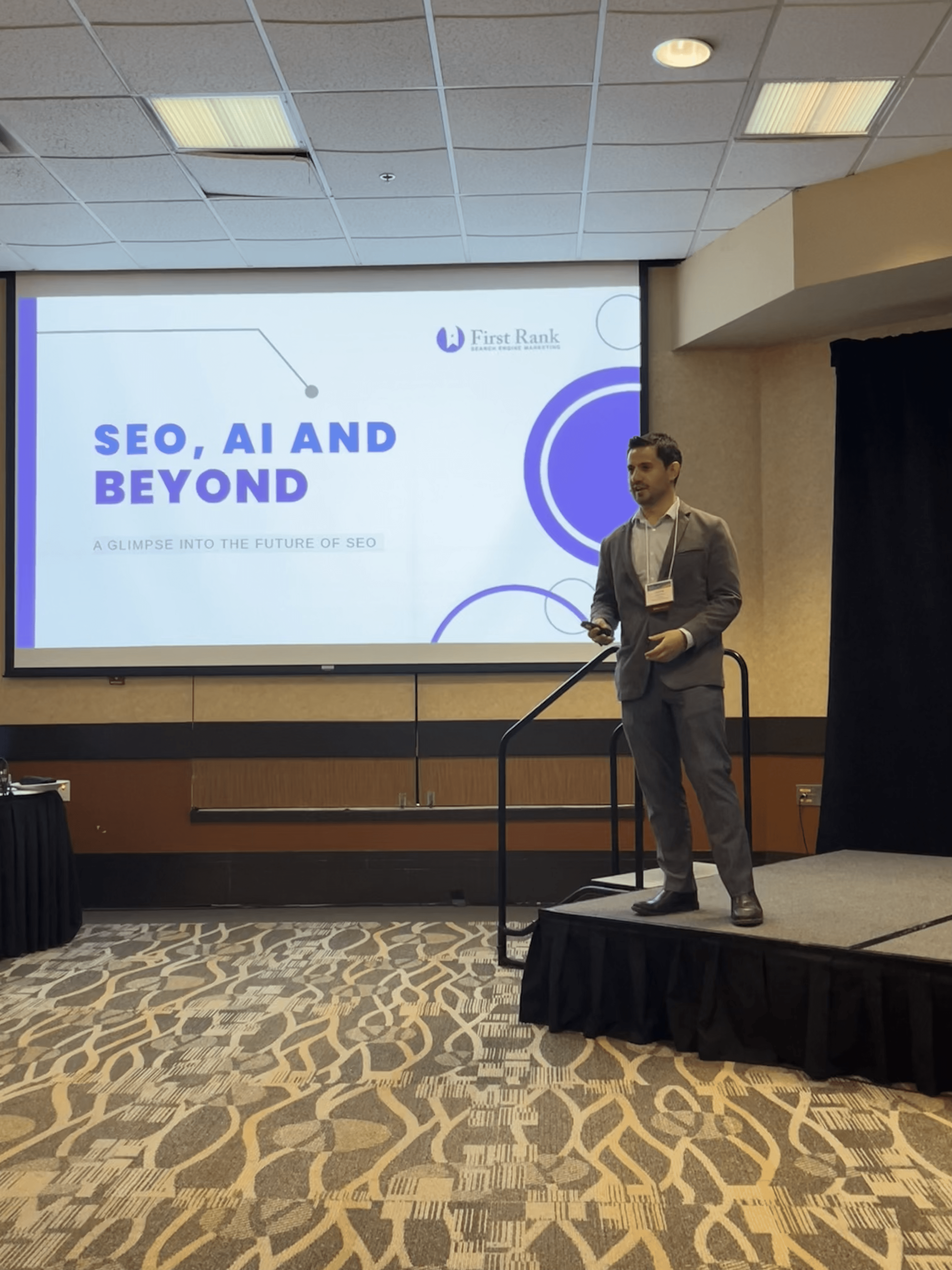 Man standing on stage presenting at digital marketing day in winnipeg