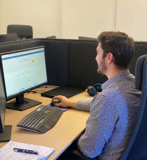 man working on computer doing seo work